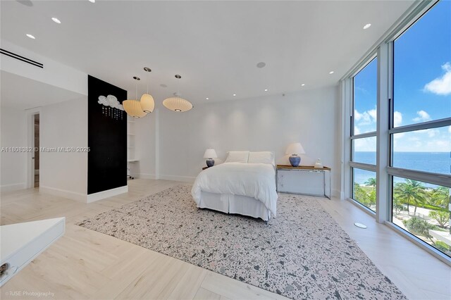 10225 Collins Ave Unit 604Renovated, Bal Harbour, FL 33154 - bedroom with a water view and recessed lighting