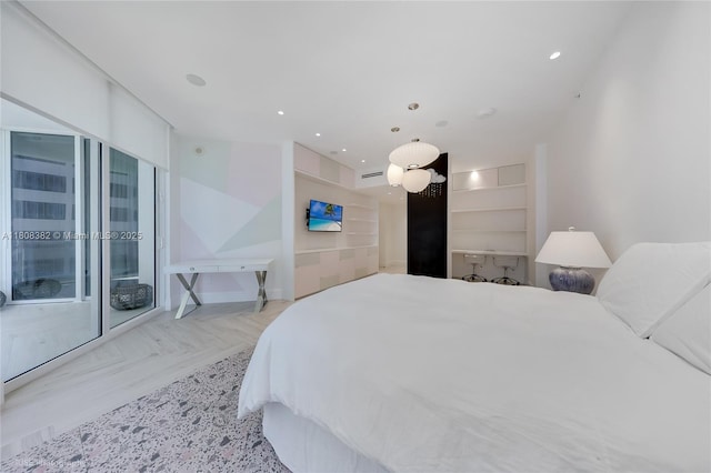 10225 Collins Ave Unit 604, Bal Harbour, FL 33154 - bedroom with access to outside and recessed lighting