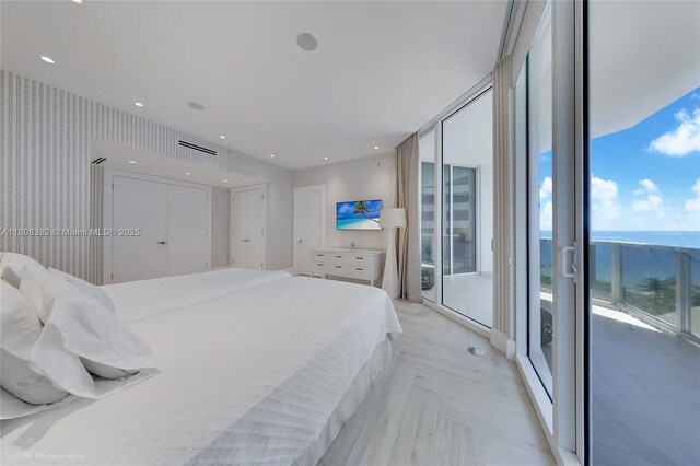 10225 Collins Ave Unit 604Renovated, Bal Harbour, FL 33154 - bedroom with access to exterior and a water view