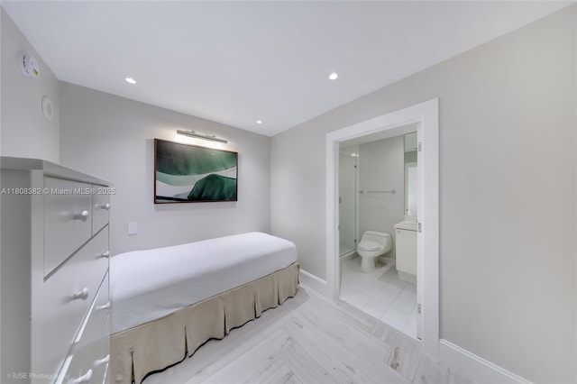 10225 Collins Ave Unit 604, Bal Harbour, FL 33154 - bedroom featuring baseboards, connected bathroom, and recessed lighting