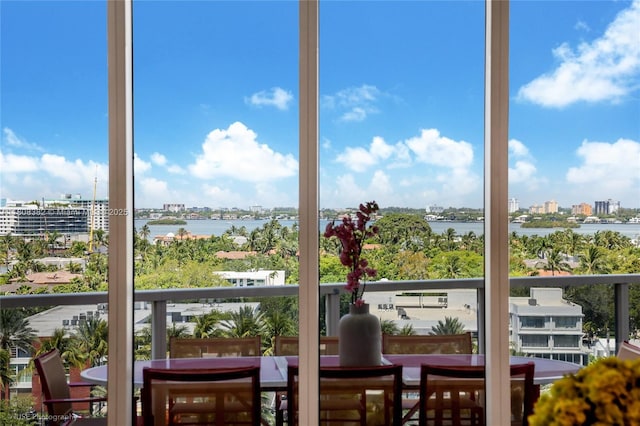 10225 Collins Ave Unit 604, Bal Harbour, FL 33154 - sunroom / solarium with a city view and a water view