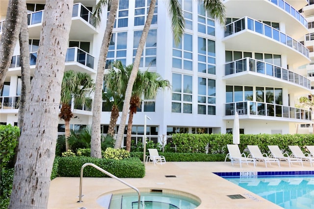10225 Collins Ave Unit 604, Bal Harbour, FL 33154 - community pool featuring a community hot tub