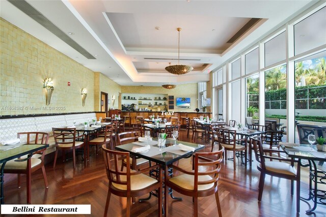 10225 Collins Ave Unit 604Renovated, Bal Harbour, FL 33154 - dining room with a tray ceiling