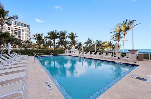 10225 Collins Ave Unit 604, Bal Harbour, FL 33154 - community pool with a patio area