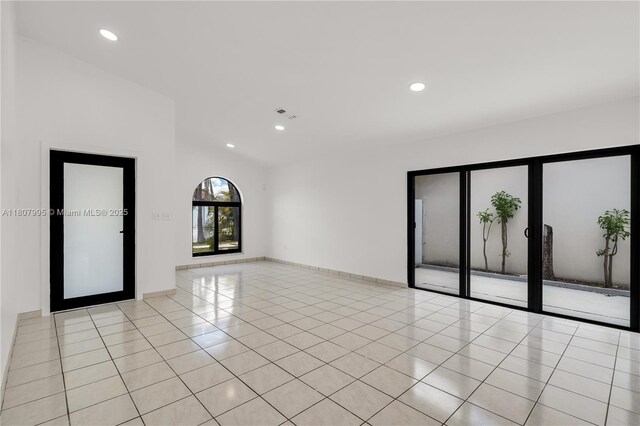 14234 SW 49th St, Miami, FL 33175 - spare room featuring recessed lighting, light tile patterned floors, french doors, and baseboards