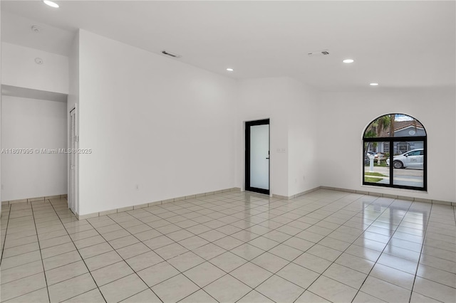 14234 SW 49th St, Miami, FL 33175 - empty room with recessed lighting, light tile patterned floors, and baseboards