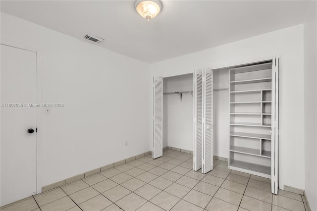 14234 SW 49th St, Miami, FL 33175 - unfurnished bedroom with light tile patterned floors and baseboards