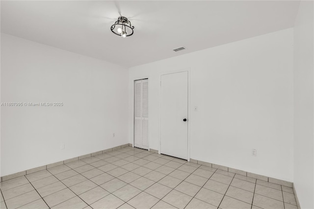 14234 SW 49th St, Miami, FL 33175 - spare room with baseboards and light tile patterned floors