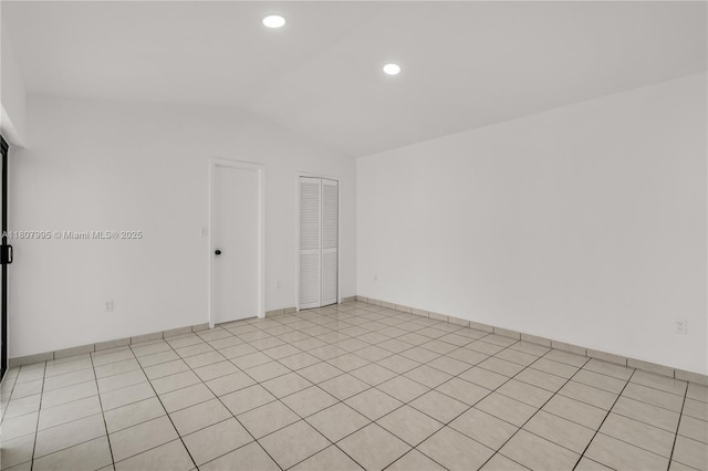 14234 SW 49th St, Miami, FL 33175 - unfurnished room with lofted ceiling and recessed lighting
