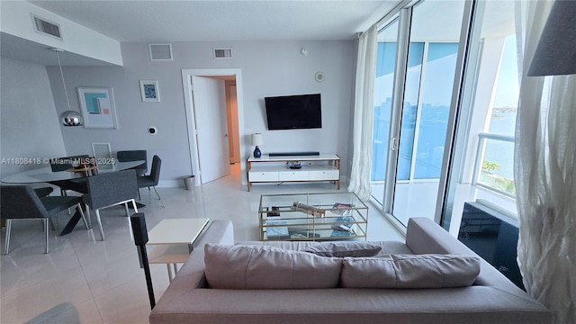 480 NE 30th St Unit 1405, Miami, FL 33137 - living room featuring light tile patterned flooring