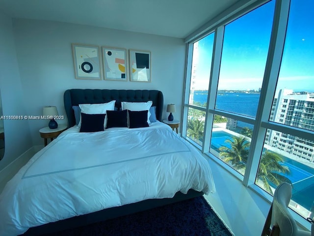 480 NE 30th St Unit 1405, Miami, FL 33137 - bedroom featuring a water view