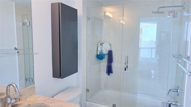 480 NE 30th St Unit 1405, Miami, FL 33137 - bathroom with shower / bath combination with glass door, toilet, and vanity