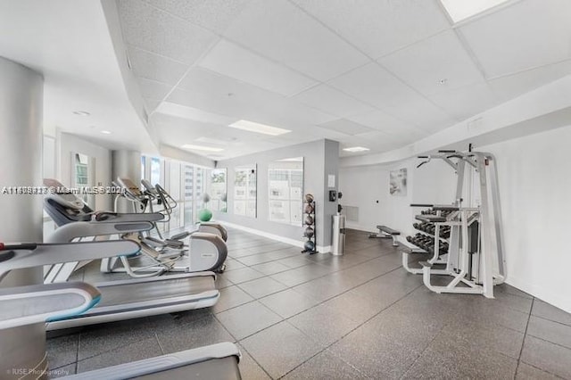 480 NE 30th St Unit 1405, Miami, FL 33137 - exercise room with a drop ceiling and baseboards