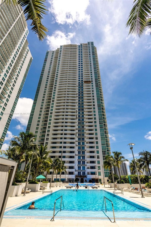 950 Brickell Bay Dr Unit 4007, Miami, FL 33131 - community pool featuring a patio