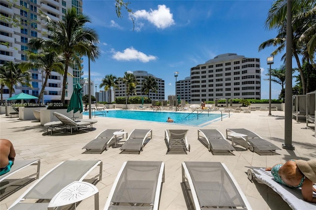 950 Brickell Bay Dr Unit 4007, Miami, FL 33131 - community pool with a patio area and a view of city
