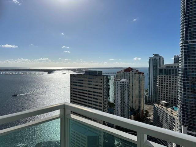 950 Brickell Bay Dr Unit 4007, Miami, FL 33131 - balcony with a water view and a view of city