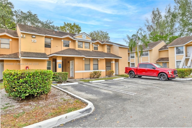 2288 SW 81st Ave Unit 2288, Miramar, FL 33025 - view of front of home with uncovered parking and stucco siding