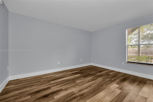 2288 SW 81st Ave Unit 2288, Miramar, FL 33025 - unfurnished room featuring dark wood finished floors and baseboards