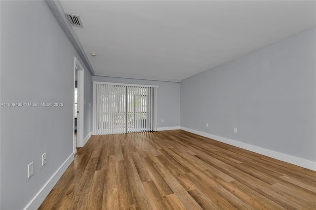 2288 SW 81st Ave Unit 2288, Miramar, FL 33025 - empty room with baseboards and wood finished floors