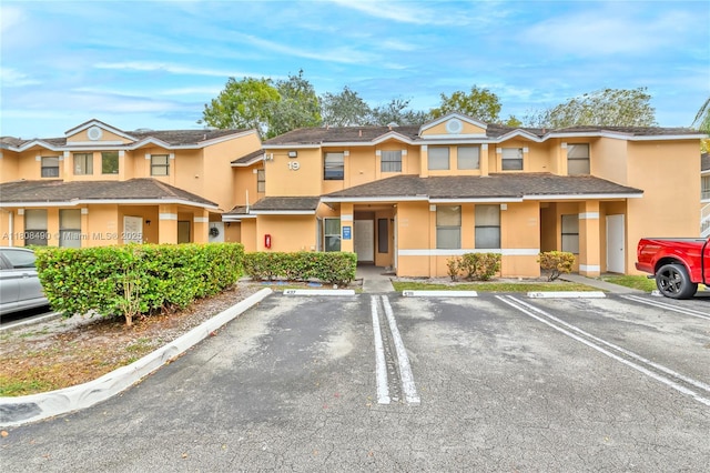 2288 SW 81st Ave Unit 2288, Miramar, FL 33025 - view of front of house with uncovered parking and stucco siding