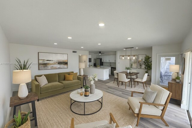 630 Layne Blvd Unit 211, Hallandale Beach, FL 33009 - living area featuring light wood-style flooring, recessed lighting, and a ceiling fan