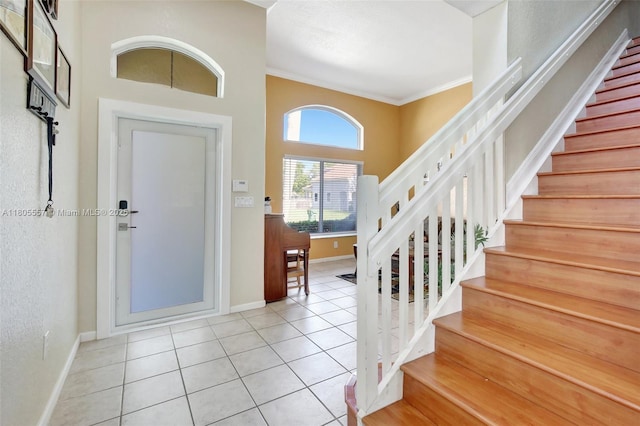 1874 NW 74th Way, Pembroke Pines, FL 33024 - tiled foyer featuring stairs, baseboards, and ornamental molding