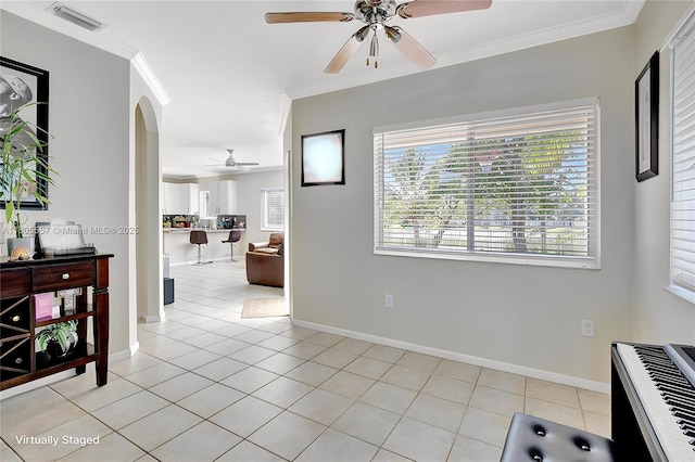 1874 NW 74th Way, Pembroke Pines, FL 33024 - dining space featuring a ceiling fan, crown molding, healthy amount of natural light, baseboards, and light tile patterned flooring