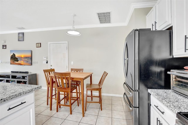 1874 NW 74th Way, Pembroke Pines, FL 33024 - dining space with crown molding, light tile patterned flooring, and baseboards
