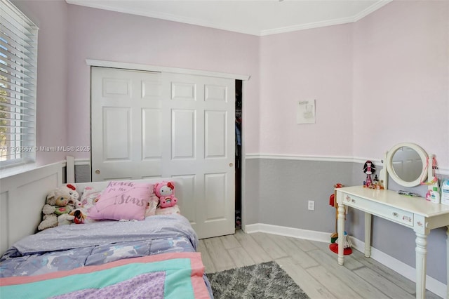 1874 NW 74th Way, Pembroke Pines, FL 33024 - bedroom with ornamental molding, wood finished floors, baseboards, and a closet