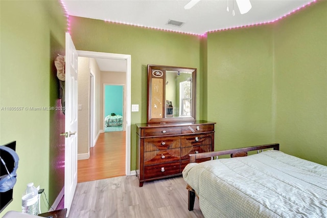 1874 NW 74th Way, Pembroke Pines, FL 33024 - bedroom featuring light wood-type flooring and a ceiling fan