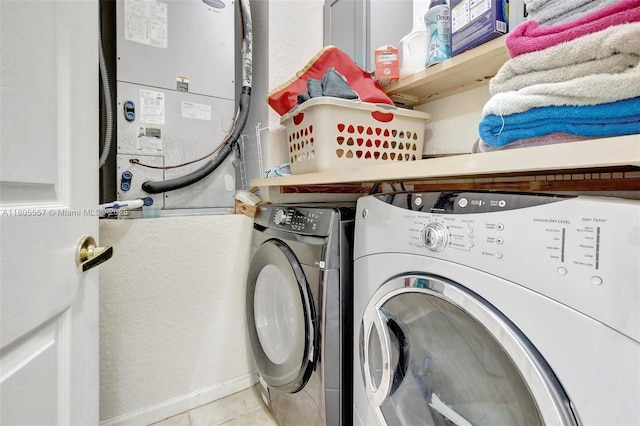 1874 NW 74th Way, Pembroke Pines, FL 33024 - laundry room featuring washing machine and dryer and tile patterned flooring