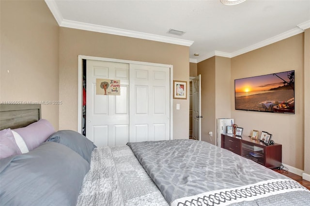 1874 NW 74th Way, Pembroke Pines, FL 33024 - bedroom with a closet, crown molding, baseboards, and wood finished floors