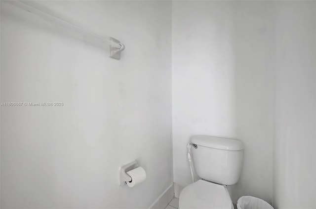 1874 NW 74th Way, Pembroke Pines, FL 33024 - bathroom with toilet and tile patterned flooring