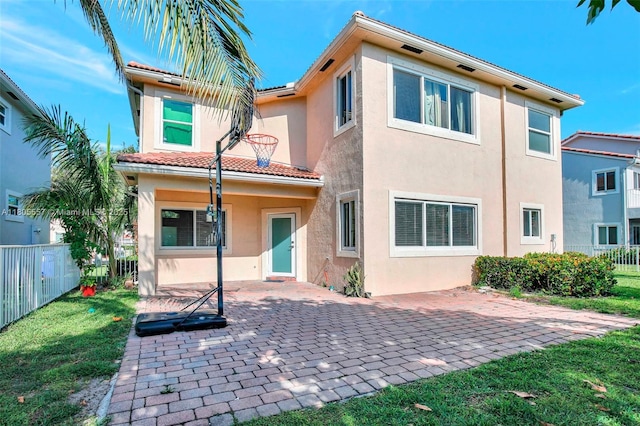 1874 NW 74th Way, Pembroke Pines, FL 33024 - rear view of property featuring a patio, stucco siding, and a tiled roof