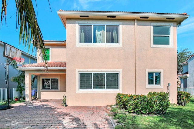1874 NW 74th Way, Pembroke Pines, FL 33024 - back of property with a patio, stucco siding, and a tiled roof