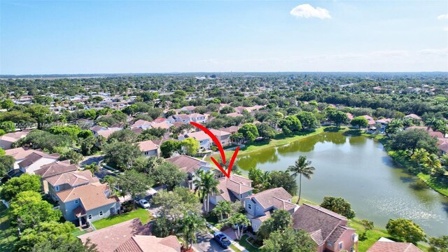 1874 NW 74th Way, Pembroke Pines, FL 33024 - aerial perspective of suburban area featuring a nearby body of water