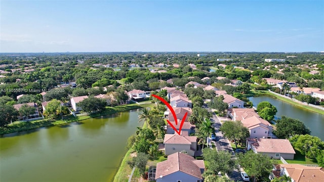 1874 NW 74th Way, Pembroke Pines, FL 33024 - aerial perspective of suburban area featuring a nearby body of water