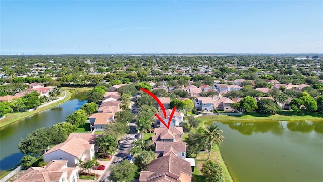 1874 NW 74th Way, Pembroke Pines, FL 33024 - aerial perspective of suburban area featuring a large body of water