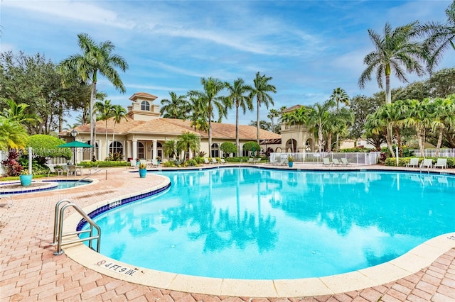 1874 NW 74th Way, Pembroke Pines, FL 33024 - community pool featuring a patio area