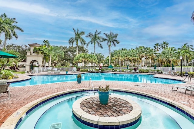 1874 NW 74th Way, Pembroke Pines, FL 33024 - community pool with a patio area