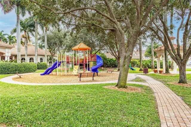 1874 NW 74th Way, Pembroke Pines, FL 33024 - community play area with a yard