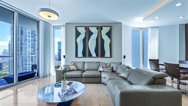185 SW 7th St Unit 2911, Miami, FL 33130 - living room with floor to ceiling windows, recessed lighting, and a city view
