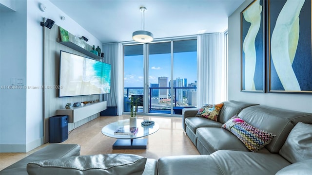 185 SW 7th St Unit 2911, Miami, FL 33130 - living area featuring floor to ceiling windows and baseboards