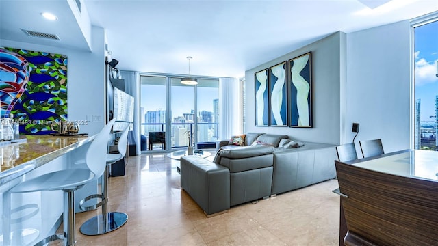 185 SW 7th St Unit 2911, Miami, FL 33130 - living room with floor to ceiling windows and a view of city