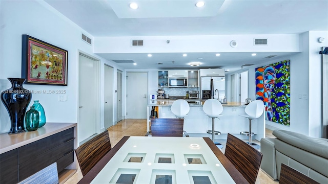 185 SW 7th St Unit 2911, Miami, FL 33130 - dining space featuring recessed lighting