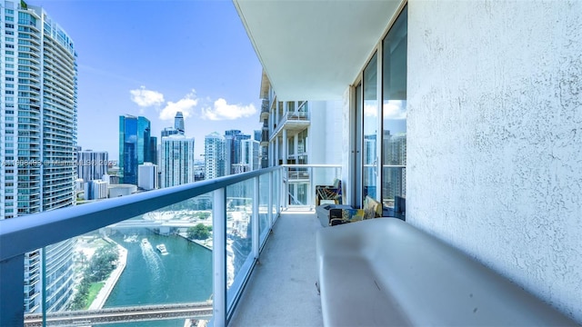 185 SW 7th St Unit 2911, Miami, FL 33130 - balcony featuring a view of skyline and a water view
