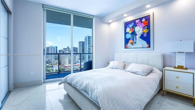 185 SW 7th St Unit 2911, Miami, FL 33130 - tiled bedroom featuring recessed lighting, access to exterior, a wall of windows, and a view of city