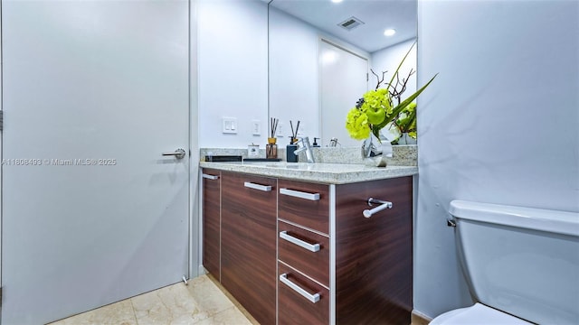 185 SW 7th St Unit 2911, Miami, FL 33130 - bathroom featuring vanity and toilet