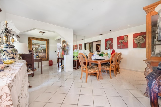 11351 SW 52nd Ter, Miami, FL 33165 - dining space featuring light tile patterned flooring and arched walkways