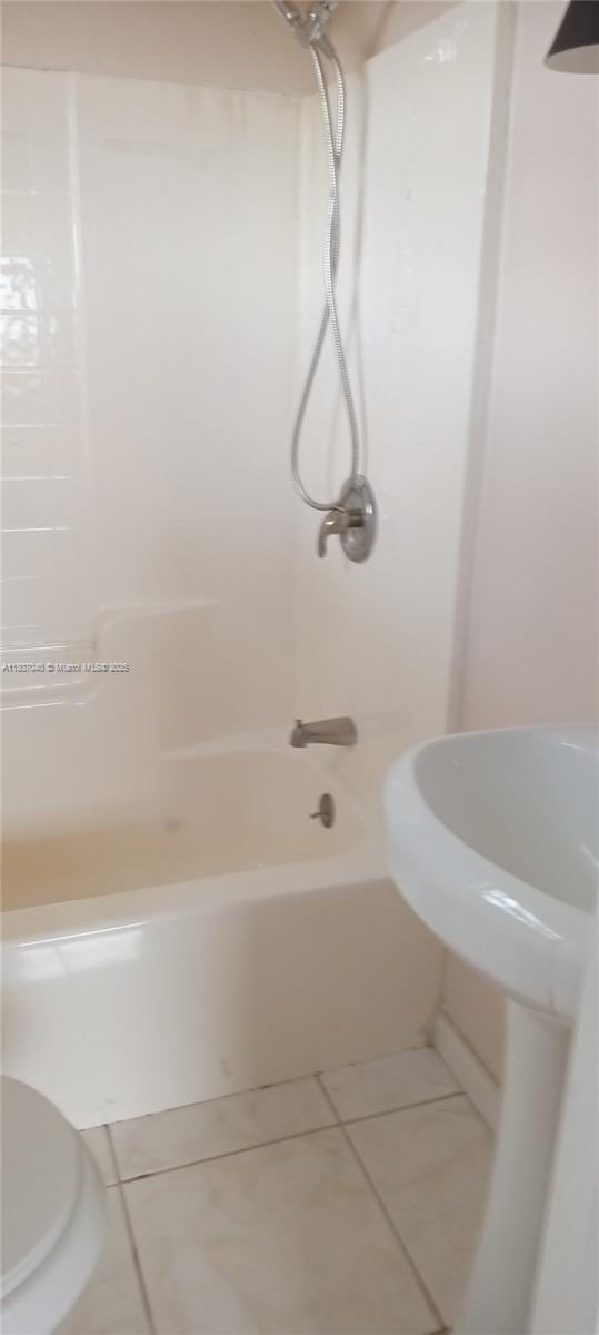 3161 NW 5th St, Lauderhill, FL 33311 - full bath featuring tub / shower combination, tile patterned flooring, and toilet
